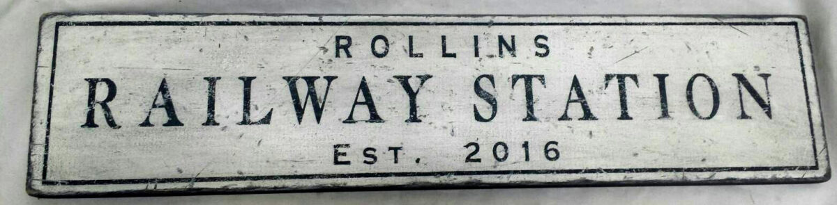 Customer Photo of the Rollins Train Station wood Sign in off white antiqued paint.