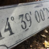 The Coordinate wood sign with personalized latitude longitude. Sign is distressed off white.