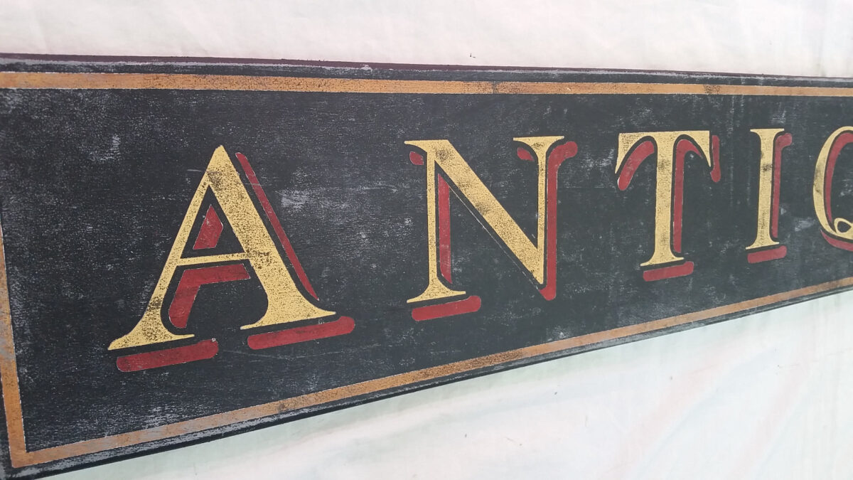 Antiques Wood Sign Close up