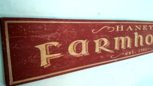 Close-up of the Haney Farmhouse wood Sign 