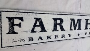The farmhouse bakery farm fresh wood sign in different font styling