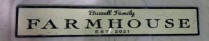 Buzell Family farm sign in distressed off white
