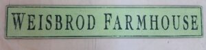 The Weisbrod Family Farm customer photo, sign painted in seafoam and black