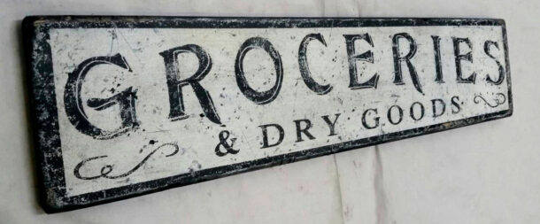 Groceries and dry goods wood sign