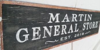 The Martin General Store sign with established date.