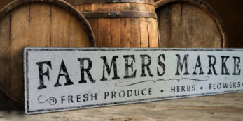 The Farmers Market sign, with custom lettering.