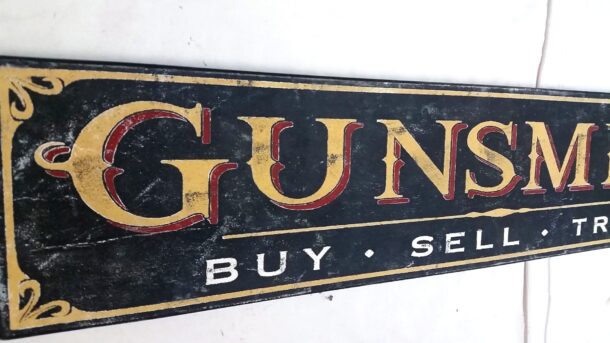 Gunsmith Antique style sign close up