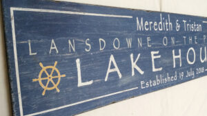 Close-up of the Personalized Lake House Sign for a wedding.