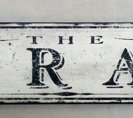 The Library Sign in an antique style, distressed wood finish.