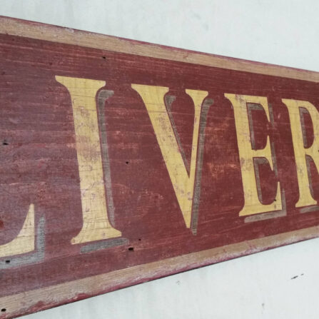 Side view of the Livery & Feed sign