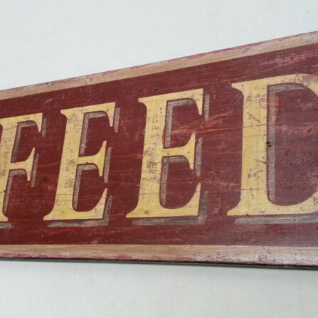 close up of antique style livery sign