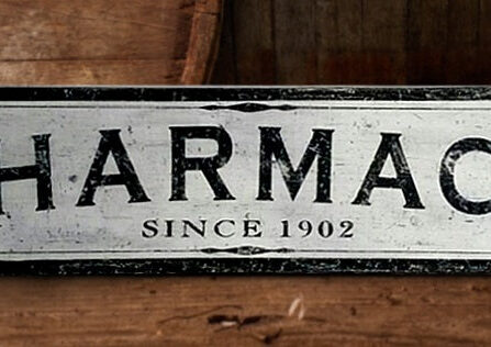 Photo of the Pharmacy Wood Sign on distressed wood