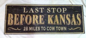 Last Stop before Kansas wood sign