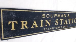 Soupman's Train Sign example in black and gold paint