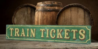 Train Tickets sign in antique green and gold