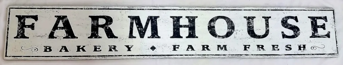 Antique-style farmhouse sign with distressed white background and black letters