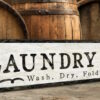 Antique style laundry sign in white and black