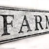 Detailed view of customizable farmhouse sign showcasing off-white background and bold lettering