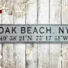 Personalized wood sign featuring city name and latitude coordinates