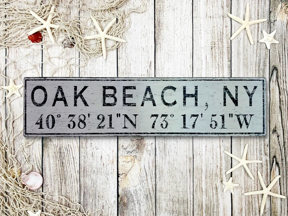 Personalized wood sign featuring city name and latitude coordinates