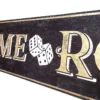 Closeup view of the antique style wood sign showcasing shimmering gold letters and a whimsical pair of dice on a black distressed background.